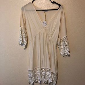 Cream dress with lace trim